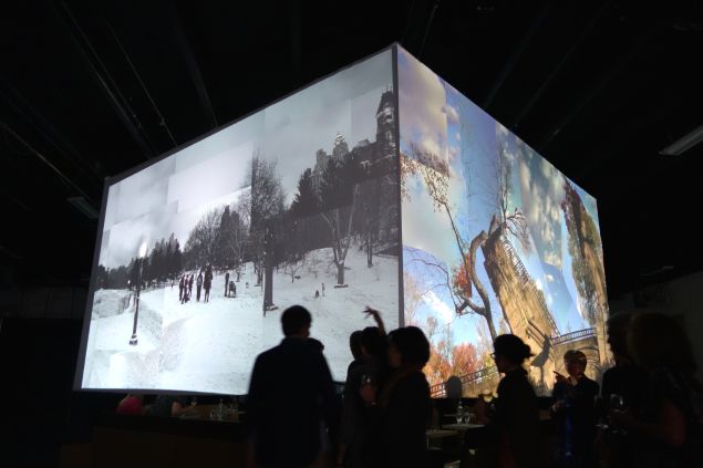 There's a dinner party inside that giant cube at Monkey Town.