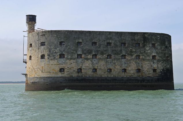 This picture taken on April 22, 2016, shows a general view of the Fort Boyard, off the western coast of France, near La Rochelle. A new access platform to the Fort Boyard was inaugurated on Friday. The Charente-Maritime county council, owner of the site, invested around 2 million euros in this work, routed from the Netherlands where it was built by the Ravestein company. / AFP / XAVIER LEOTY