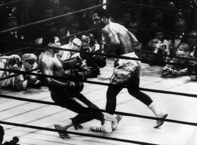 March 1971: In a title fight at Madison Square Garden, New York, Muhammad Ali goes down in the 15th round to a left hook from world heavyweight champion Joe Frazier who kept the title with an unanimous points win. 
