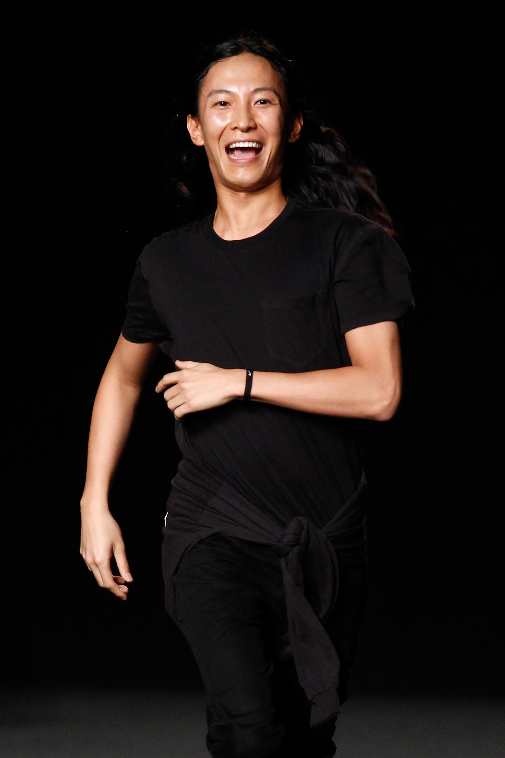 NEW YORK, NY - SEPTEMBER 06: Designer Alexander Wang appears on the runway at the Alexander Wang fashion show during Mercedes-Benz Fashion Week Spring 2015 at Pier 94 on September 6, 2014 in New York City.