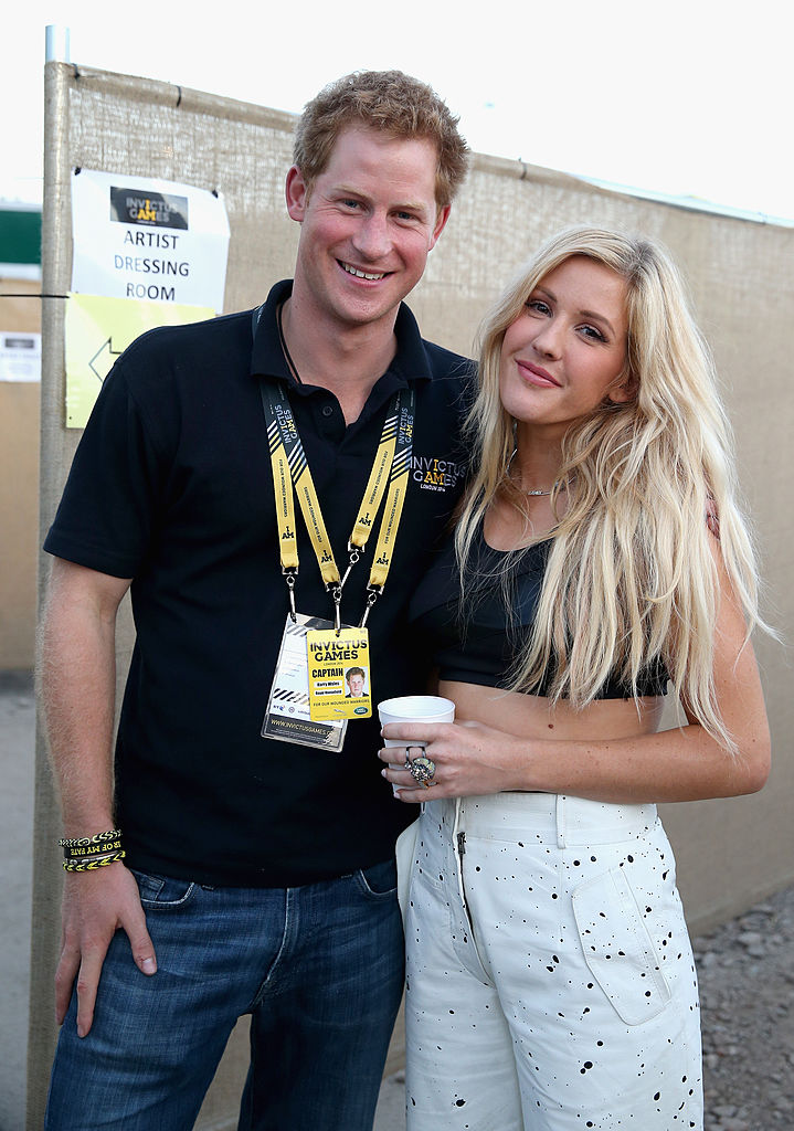 LONDON, ENGLAND - SEPTEMBER 14: Prince Harry with Ellie Goulding backstage at the Invictus Games Closing Ceremony during the Invictus Games at Queen Elizabeth park on September 14, 2014 in London, England. The International sports event for 'wounded warriors', presented by Jaguar Land Rover was an idea developed by Prince Harry after he visited the Warrior Games in Colorado USA. The four day event has brought together thirteen teams from around the world to compete in nine events such as wheelchair basketball and sitting volleyball. `
