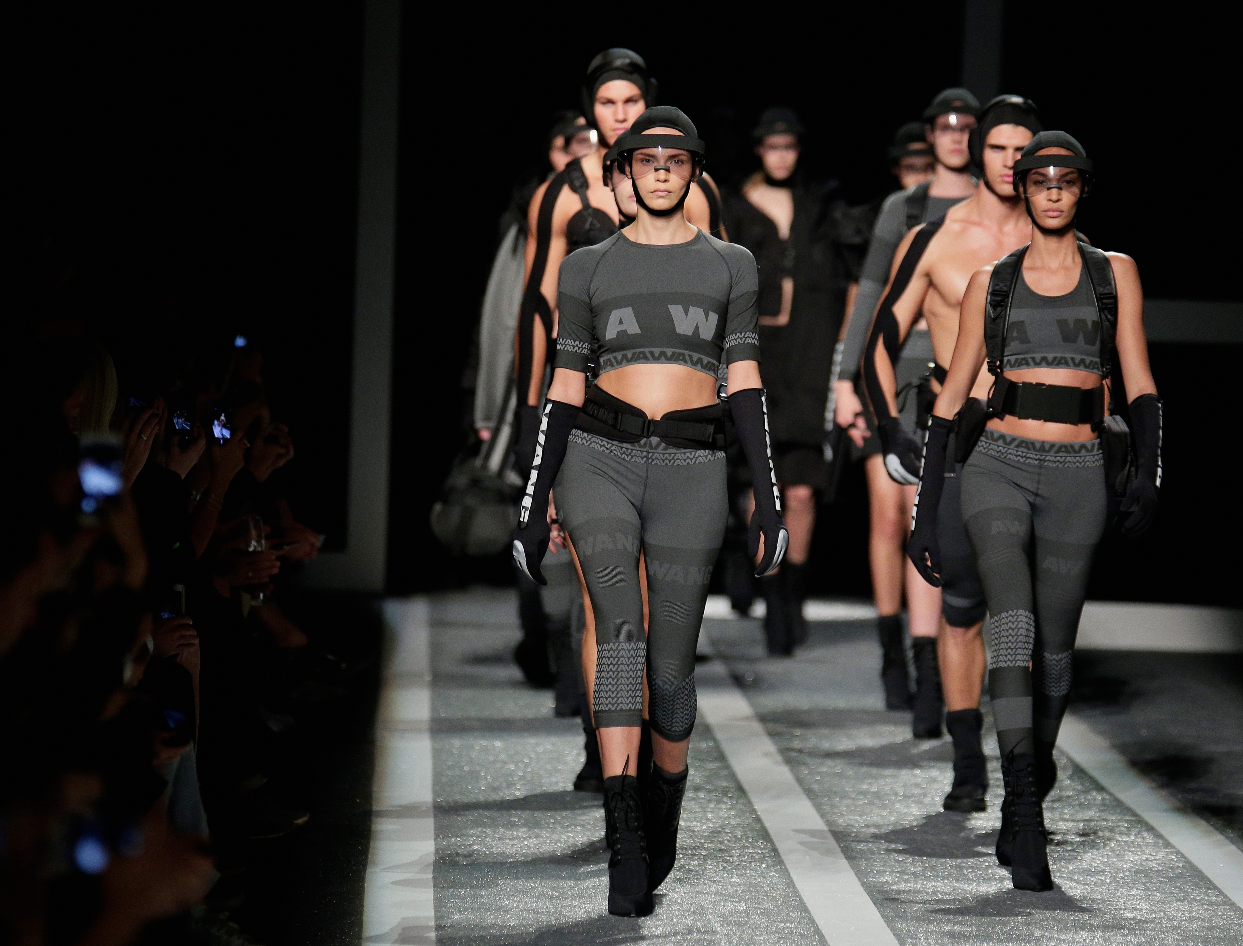 NEW YORK, NY - OCTOBER 16: Joan Smalls (R) and models walk the runway at the Alexander Wang X H&M Launch on October 16, 2014 in New York City.
