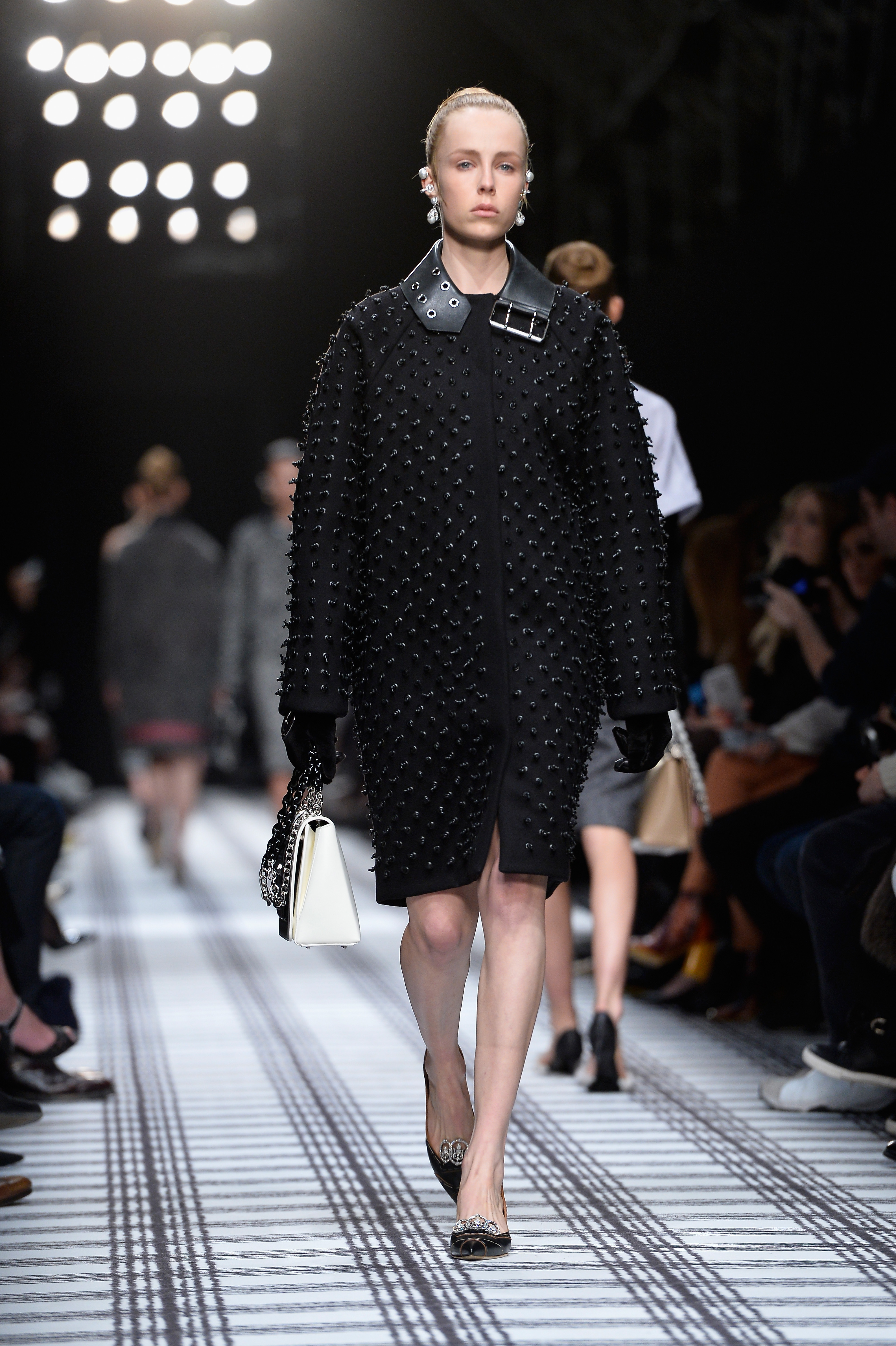 PARIS, FRANCE - MARCH 06: A model walks the runway during the Balenciaga show as part of the Paris Fashion Week Womenswear Fall/Winter 2015/2016 on March 6, 2015 in Paris, France.