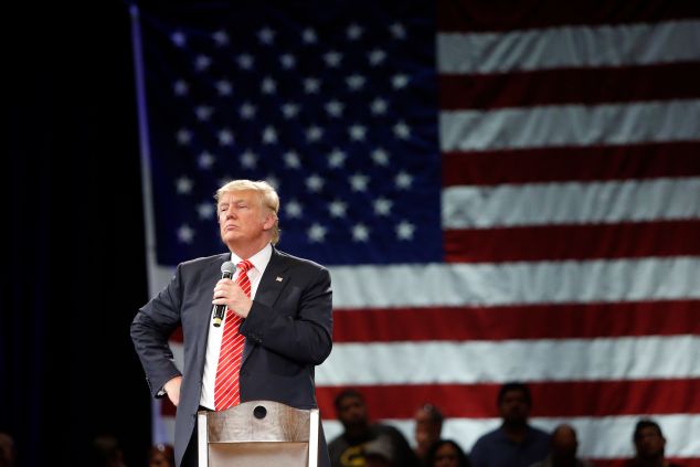 Republican presidential candidate Donald Trump speaks to supporters during a town hall meeting on March 14, 2016 at the Tampa Convention Center in Tampa , Florida.