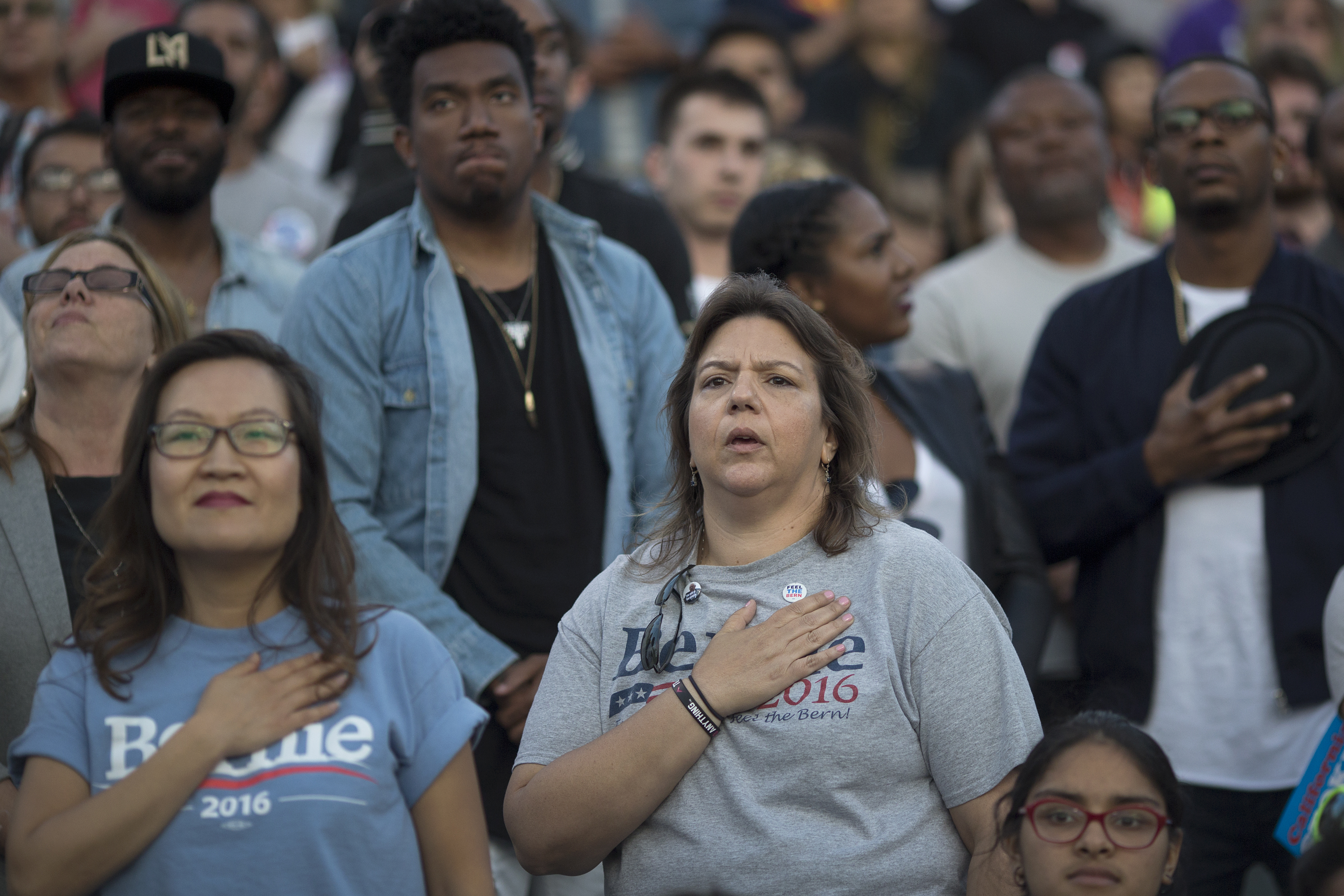 Voters recite the Pledge of Allegiance