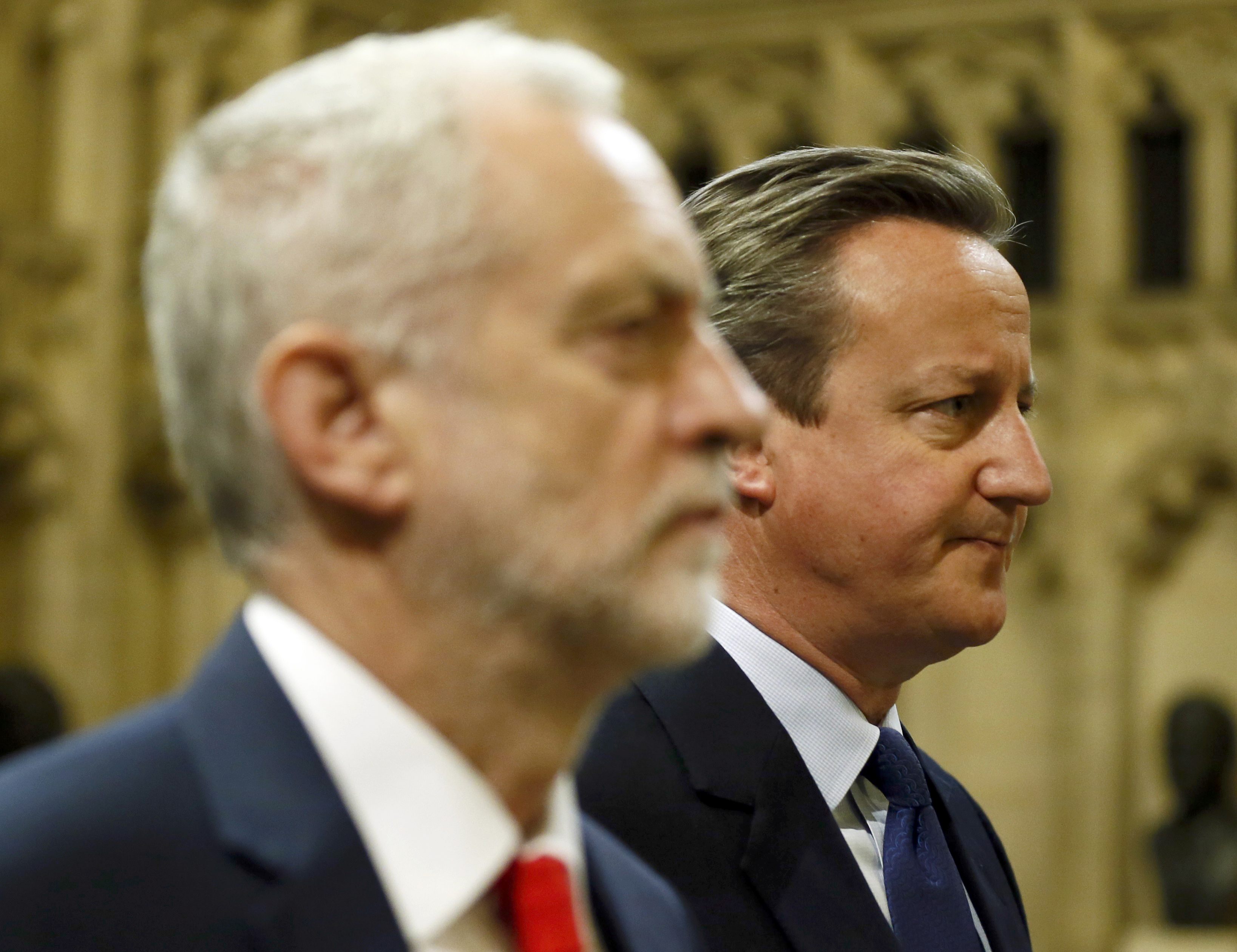 Prime Minister David Cameron (R) and Labour Party leader Jeremy Corbyn