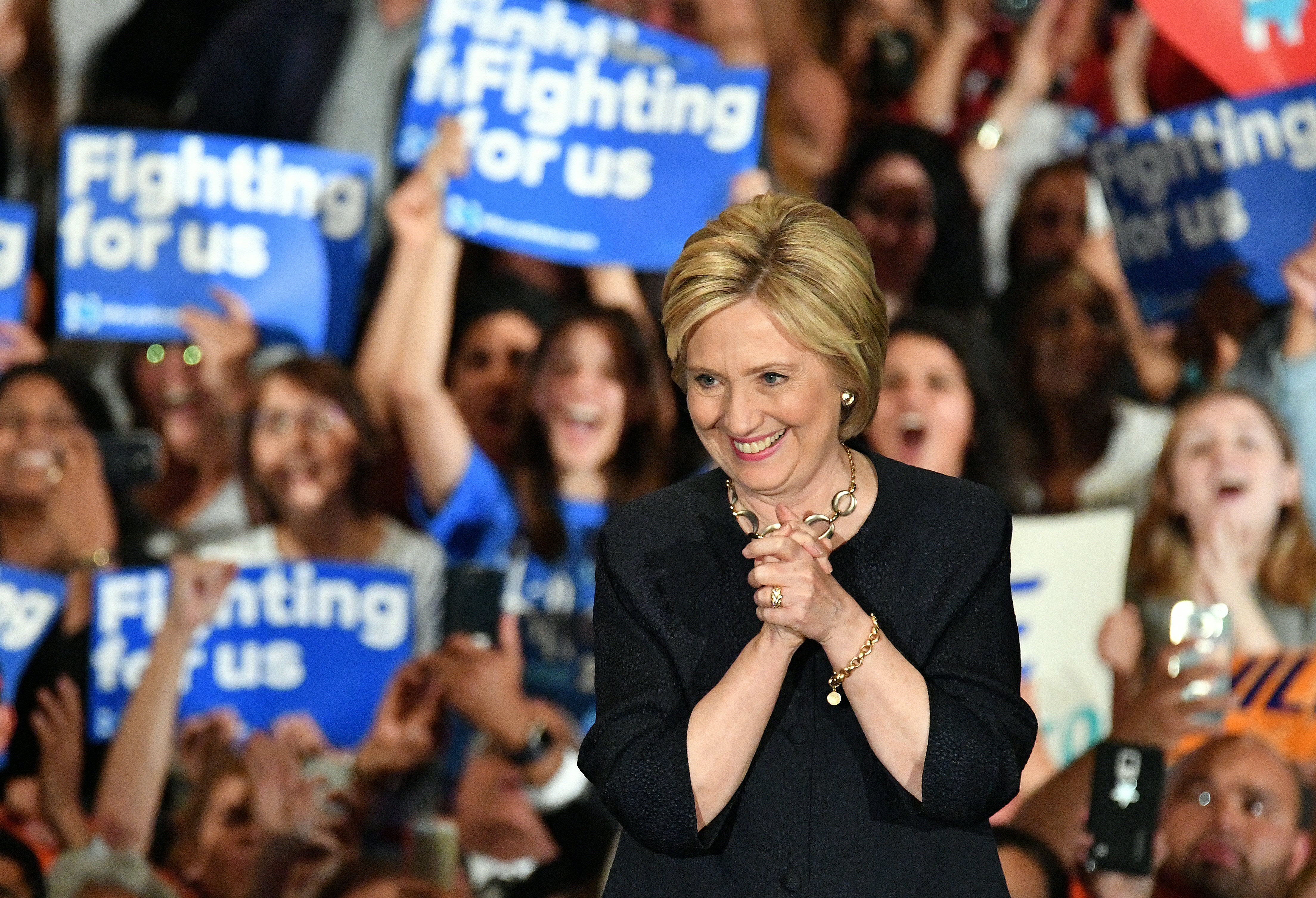 Democratic presidential candidate Hillary Clinton reacts after being introduced at a rally in San Jose, California on May 26, 2016.