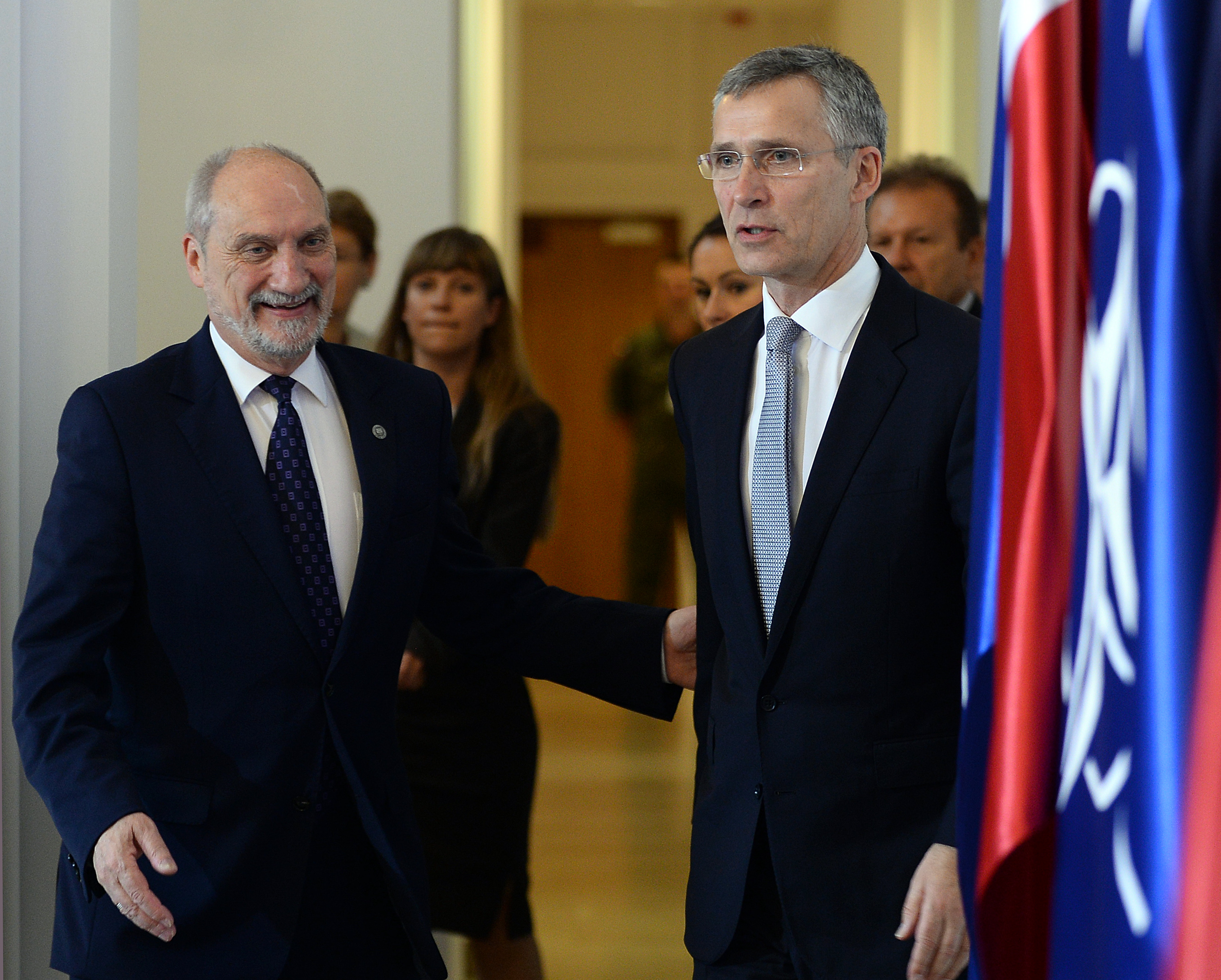 NATO Secretary General Jens Stoltenberg (R) and Polish Defence Minister Anoni Macierewicz arrive for a meeting ahead of a NATO summit, on May 31, 2016 in Warsaw. / AFP / JANEK SKARZYNSKI 