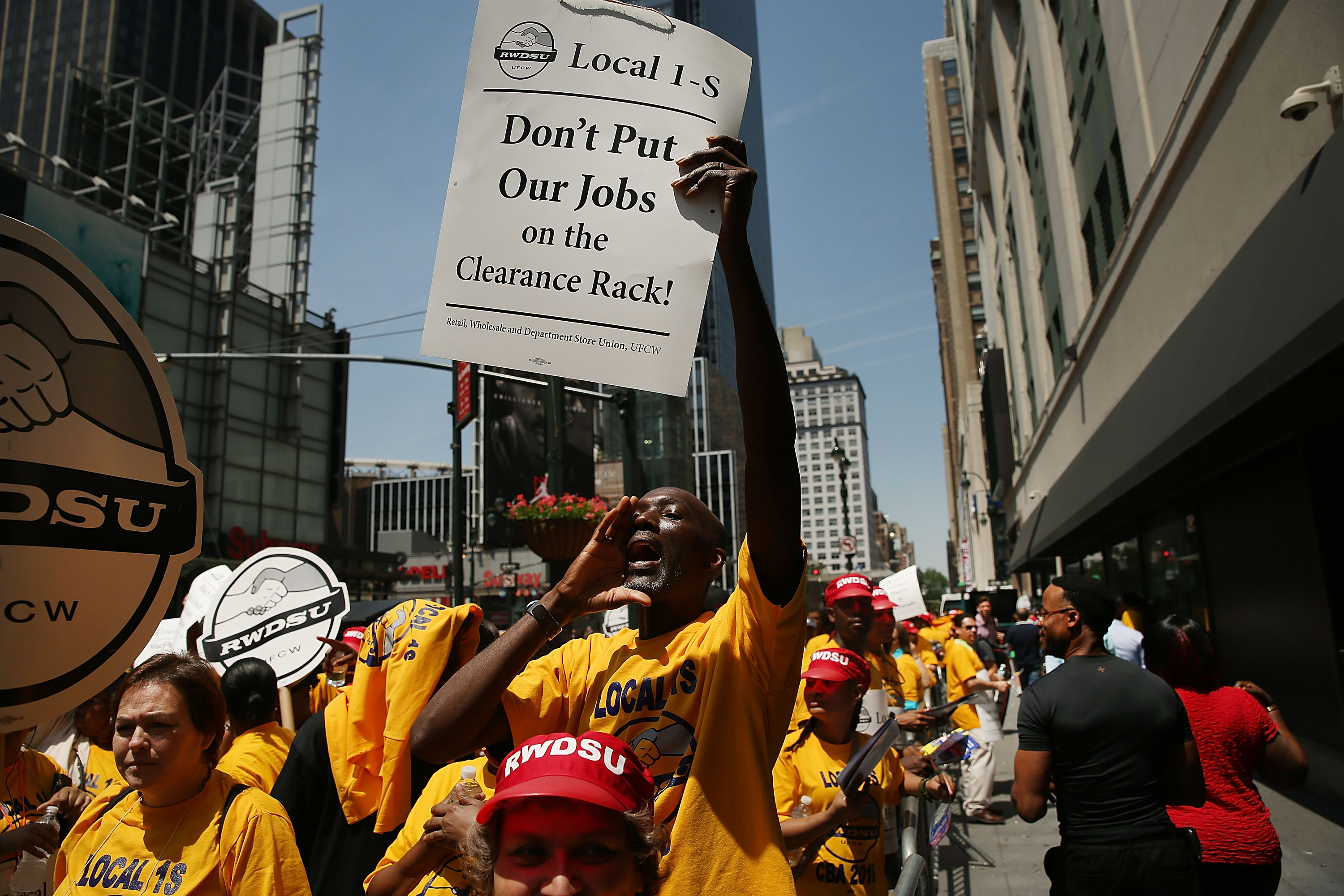 NEW YORK, NY - JUNE 02: Macy's workers and other union activists hold a demonstration outside of the retailer's flagship store at Herald Square in Manhattan on June 2, 2016 in New York City.