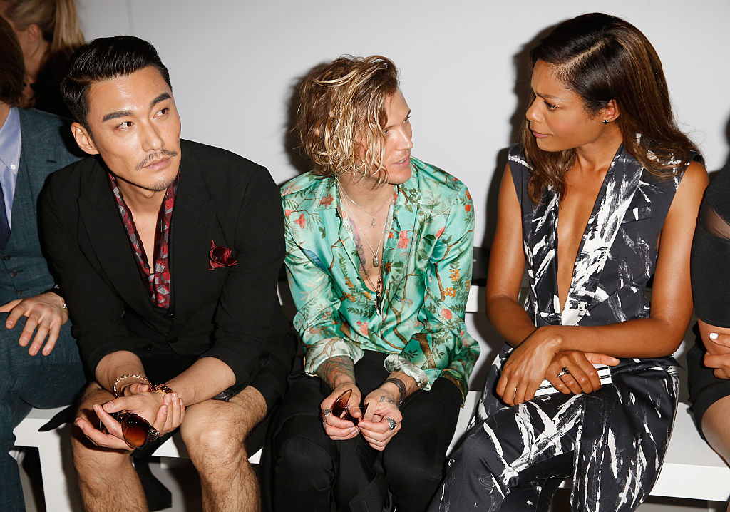 Hun Bing, Dougie Poynter and Naomie Harris attend the Songzio show during The London Collections Men SS17 at BFC Show Space on June 13, 2016 in London, England.
