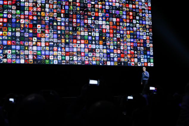 Apple CEO Tim Cook delivers the keynote presentation at Apple's annual Worldwide Developers Conference at the Bill Graham Civic Auditorium in San Francisco, California, on June 13, 2016.