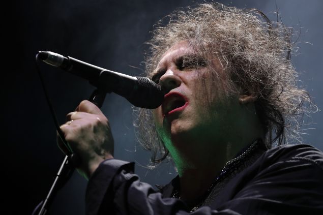 Robert Smith of The Cure performs on stage at Madison Square Garden.