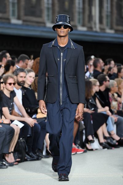 Nothing goes together better than a bucket hat and a boiler suit