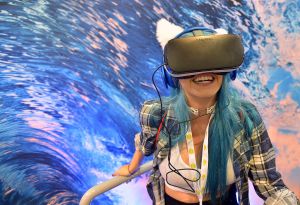ANAHEIM, CA - JUNE 24: A VidCon attendee experiences Samsung Gear VR at The Samsung Experience at VidCon 2016 on June 23, 2016 in Los Angeles, California.