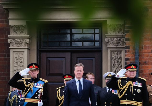 (L-R) Prince Edward, Duke of Kent, Prime Minister David Cameron and General Sir Chris Deverell are joined by other dignataries as they take the salute during the main military parade during the Armed Forces Day National Event on June 25, 2016 in Cleethorpes, England. The visit by the Prime Minister came the day after the country voted to leave the European Union. Armed Forces Day is an annual event that gives an opportunity for the country to show its support for the men and women in the British Armed Forces.