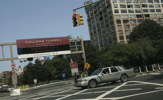 Police arrested three individuals carrying weapons outside the Holland Tunnel.