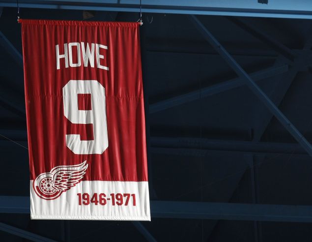 The jersey retirement banner for Gordie Howe #9 of the Detroit Red Wings (1946-1971) hangs in the rafters during a game against the Minnesota Wild on March 11, 2010 at Joe Louis Arena in Detroit, Michigan.