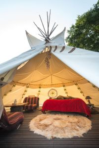 Stay in one of Glamping Hub's accommodations, like this remote and cozy tipi.