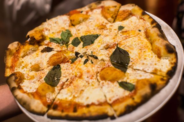 Not your ordinary pizza served at this party.