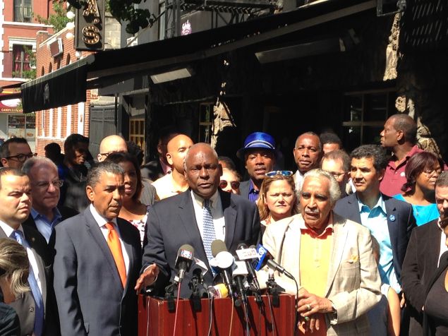 Assemblyman Keith Wright, center, flanked by State Senator Adriano Espaillat and Congressman Charles Rangel.