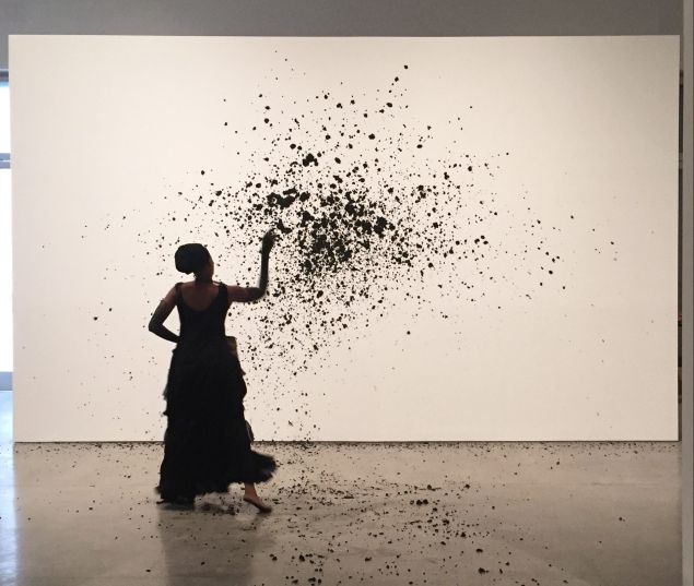 Wangetchi Mutu performing Throw at Pace Gallery. 