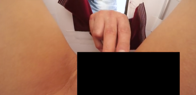 Milo Moiré's crotch inside the mirrored box.
