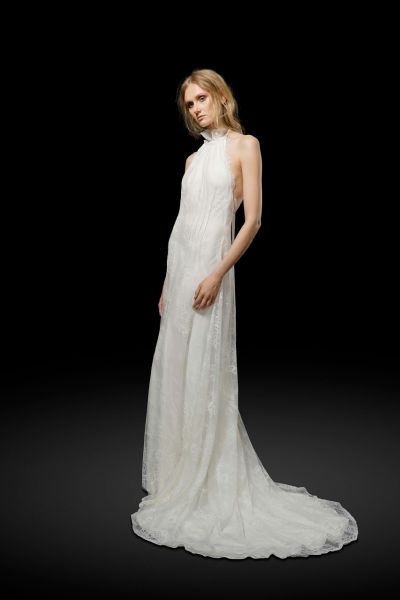 The Dress: Elizabeth Fillmore renders the simplest of silhouettes in exquisite Chantilly lace for a sweetly romantic halter gown with a shirred back and chiffon ties.