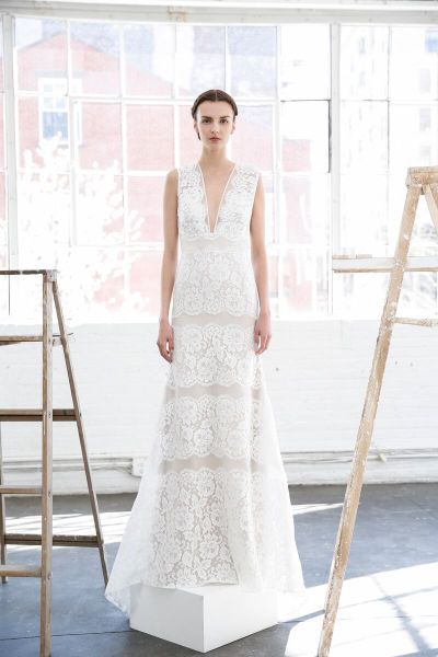 THE DRESS: Crips and clean as a Nantucket sunrise, this organza sheath from Lela Rose teases tradition with its plunging V-neck and generous bands of lace.