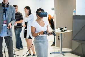 An attendee tries an HTC Vive at Games For Change 2016. 