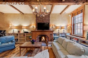 One of the five wood-burning fireplaces pictured above...