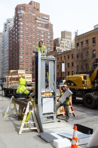 A LinkNYC wifi kiosk going in.