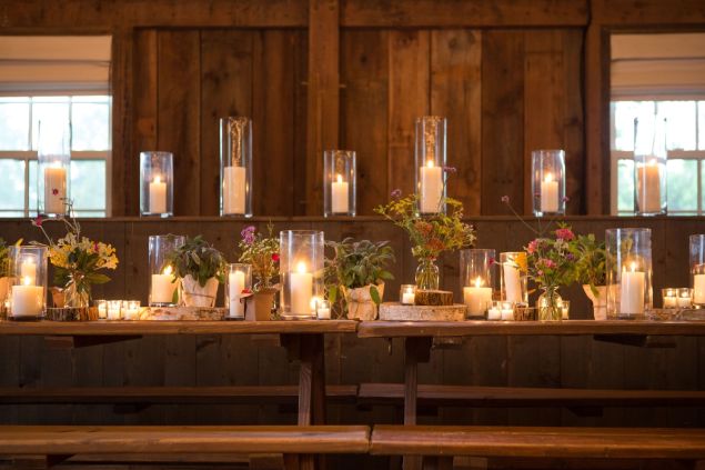 Guests gathered at beautifully set picnic tables.