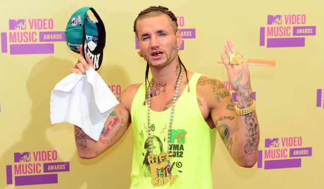 Riff Raff poses on arrival on the red carpet for the MTV Video Music Awards in Los Angeles on September 6, 2012 in California. 