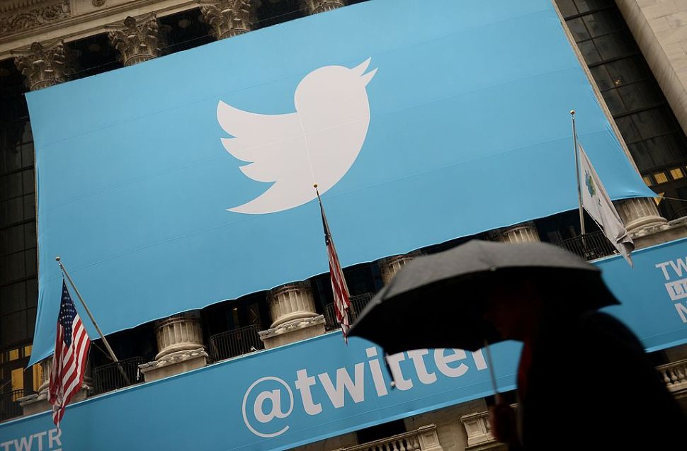 A banner with the logo of Twitter is set on the front of the New York Stock Exchange (NYSE) on November 7, 2013 in New York. Twitter hit Wall Street with a bang on Thursday, as an investor frenzy quickly sent shares surging after the public share offering for the fast-growing social network. In the first exchanges, Twitter vaulted 80.7 percent to $47, a day after the initial public offering (IPO) at $26 per share. While some analysts cautioned about the fast-changing nature of social media, the debut led to a stampede for Twitter shares. AFP PHOTO/EMMANUEL DUNAND (Photo credit should read EMMANUEL DUNAND/AFP/Getty Images)
