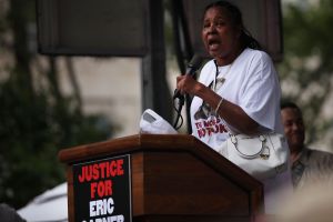 Esaw Garner, widow of Eric Garner, speaks at a rally in Brooklyn one year ago on the one-year anniversary of her husband's death