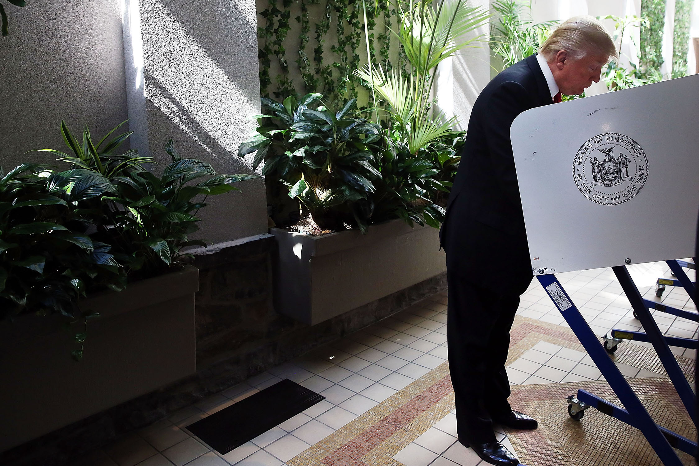 Republican Presidential candidate Donald Trump votes at his local polling station in New York's primary on April 19, 2016.