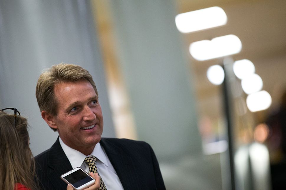 WASHINGTON, DC - MAY 9: Sen. Jeff Flake (R-AZ) speaks with reporters after a vote at the U.S. Capitol, May 9, 2016, in Washington, DC. Senate Democrats defeated a procedural vote on an energy bill, which increases funding for the Department of Energy and Army Corps of Engineers.