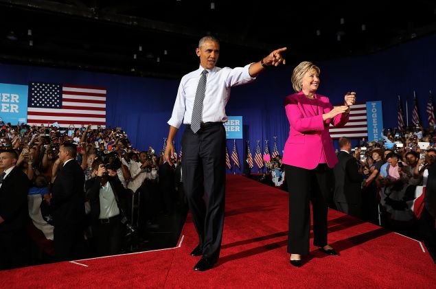 CHARLOTTE, NC - JULY 05: Democratic presidential candidate former Secretary of State Hillary Clinton (R) and U.S. president Barack Obama greet supporters during a campaign rally on July 5, 2016 in Charlotte, North Carolina. Hillary Clinton is campaigning with president Obama in North Carolina.