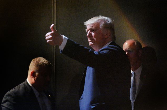 RALEIGH, NC - JULY 5: Presumptive Republican presidential nominee Donald Trump motions to the crowd while leaving the stage after a campaign event at the Duke Energy Center for the Performing Arts on July 5, 2016 in Raleigh, North Carolina. Earlier in the day Hillary Clinton campaigned in Charlotte, North Carolina with President Barack Obama. 