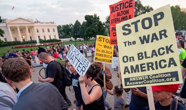 Protestors rally outside the White House.