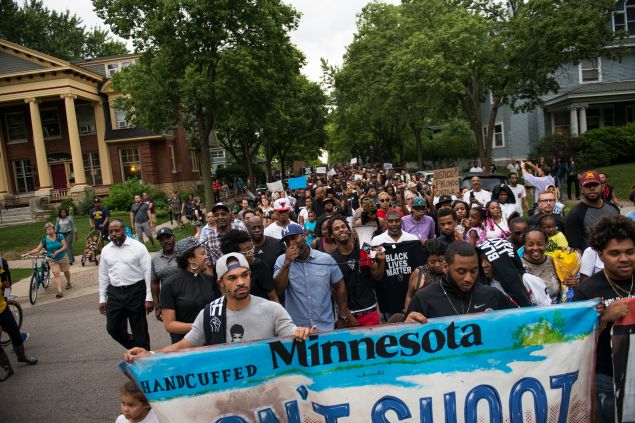 Protestors march through the streets during a demonstration for Philando Castile in St. Paul, Minnesota.
