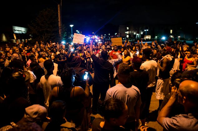 Protestors gather at the intersection where Philando Castile was shot and killed.