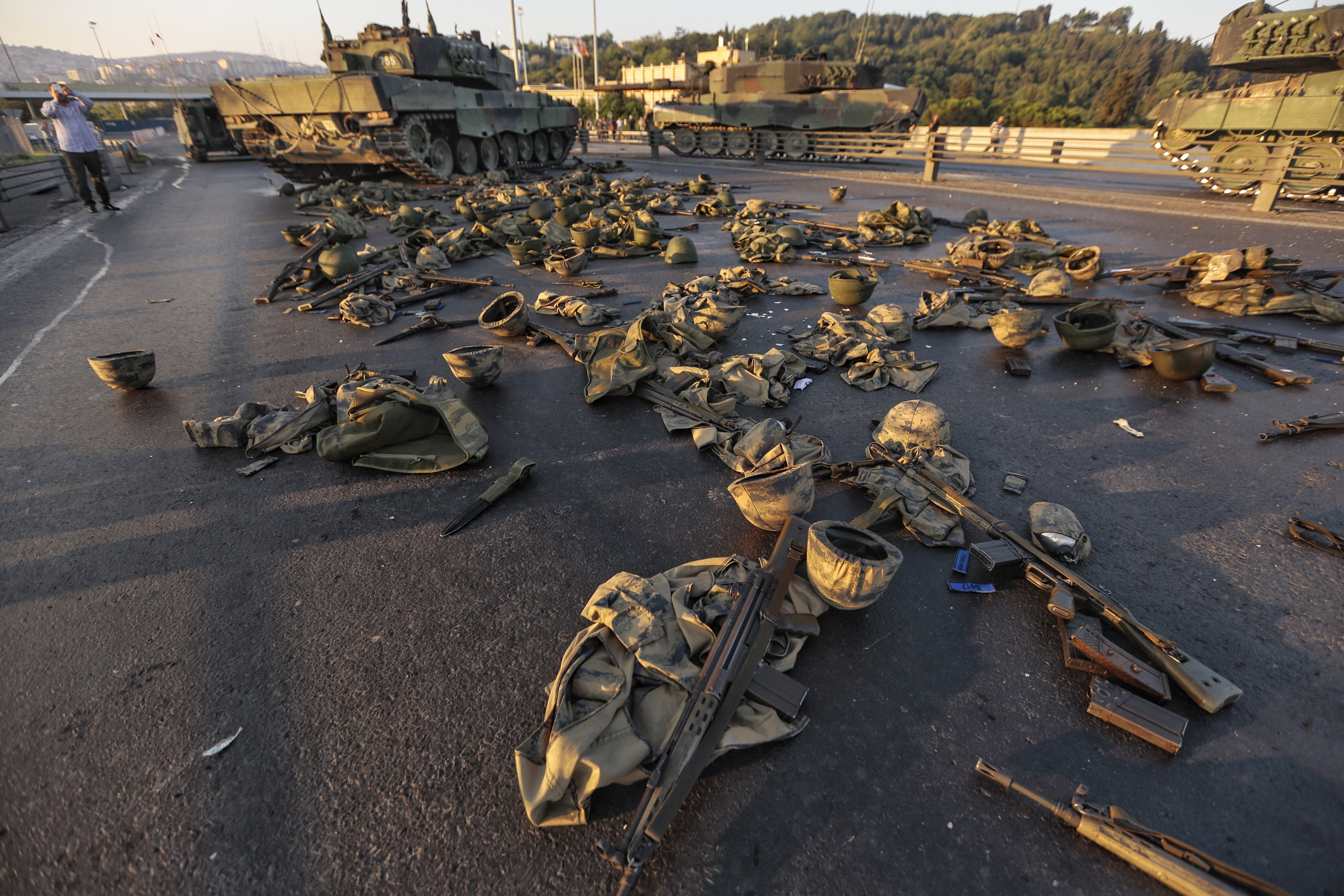 Clothes and weapons belonging to soldiers involved in the coup attempt that have now surrendered lie on the ground abandoned on Bosphorus bridge on July 16, 2016, Istanbul,Turkey.