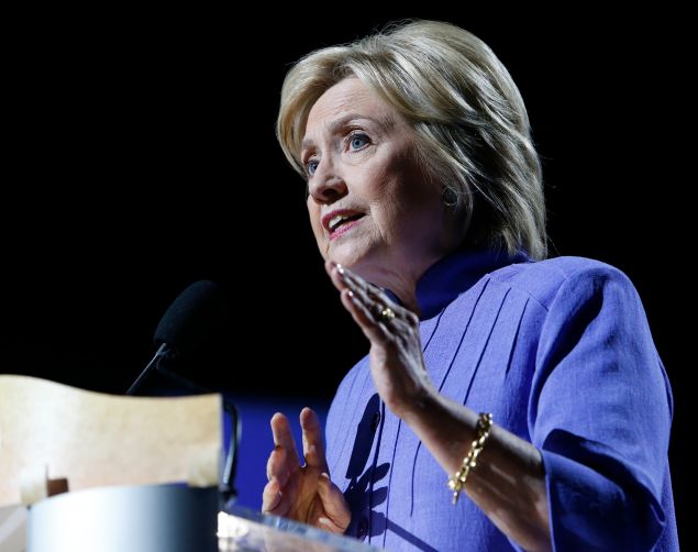 Democratic presidential candidate Hillary Clinton speaks at the NAACP National Convention in Cincinnati, Ohio on July 18, 2016. / AFP / Jay LaPrete