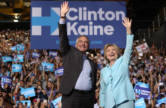 Democratic presidential candidate former Secretary of State Hillary Clinton and Democratic vice presidential candidate U.S. Sen. Tim Kaine (D-VA) greet supporters during a campaign rally at Florida International University Panther Arena on July 23, 2016 in Miami, Florida. Hillary Clinton and Tim Kaine made their first public appearance together a day after the Clinton campaign announced Senator Kaine as the Democratic vice presidential candidate.