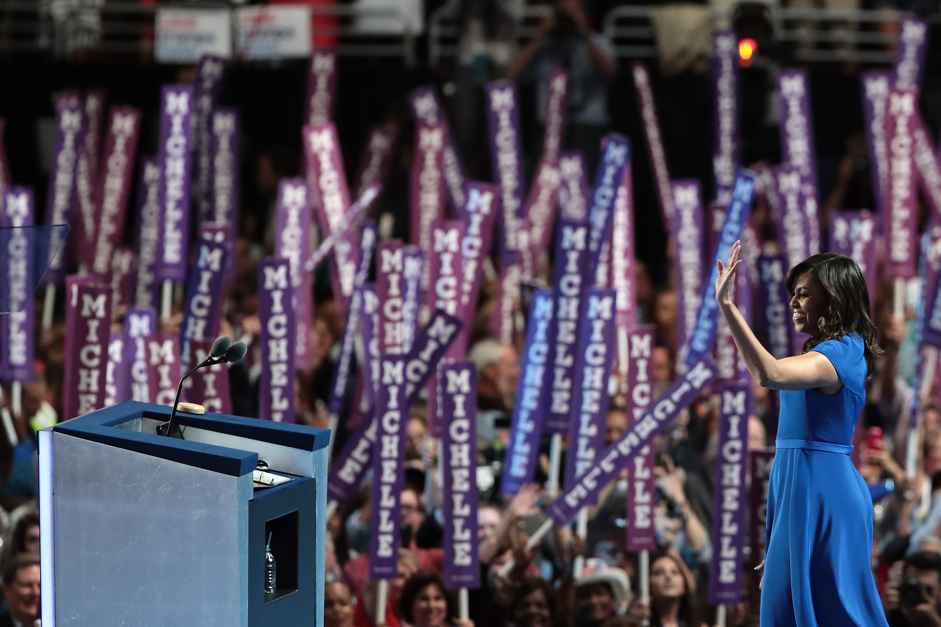 First lady Michelle Obama acknowledges the crowd after delivering remarks on the first day of the Democratic National Convention at the Wells Fargo Center, July 25, 2016 in Philadelphia, Pennsylvania.