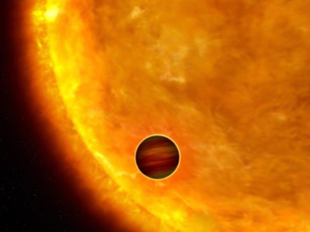 -, SPACE: Picture released 04 October 2006 by the European Space Agency shows an artist's impression of a Jupiter-sized planet passing in front of its parent star. Such events are called transits. When the planet transits the star, the star?s apparent brightness drops by a few percent for a short period. Through this technique, astronomers can use the Hubble Space Telescope to search for planets across the galaxy by measuring periodic changes in a star?s luminosity. The first class of exoplanets found by this technique are the so-called ?hot Jupiters,? which are so close to their stars they complete an orbit within days, or even hours. A seam of stars at the centre of the Milky Way has shown astronomers that an entirely new class of planets closely orbiting distant suns is waiting to be explored, according to a paper published 04 October 2006. An international team of astronomers, using a camera aboard NASA's Hubble telescope, delved into a zone of the Milky Way known as the "galactic bulge", thus called because it is rich in stars and in the gas and dust which go to make up stars and planets. The finding opens up a new area of investigation for space scientists probing extrasolar planets - planets that orbit stars other than our own. AFP PHOTO NASA/ESA/K. SAHU (STScI) AND THE SWEEPS SCIENCE TEAM 