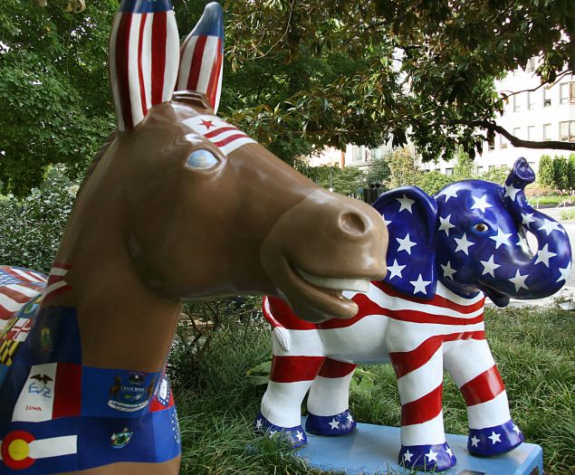 The symbols of the Democratic(L) (donkey) and Republican (elephant) parties are seen on display in Washington, DC on August 25, 2008.