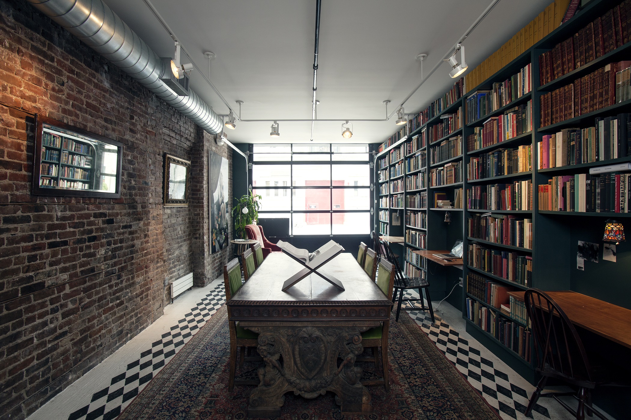 Host your next book party in this cozy Manhattan apartment library.