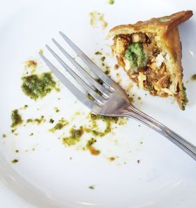 There's butter chicken inside this samosa.